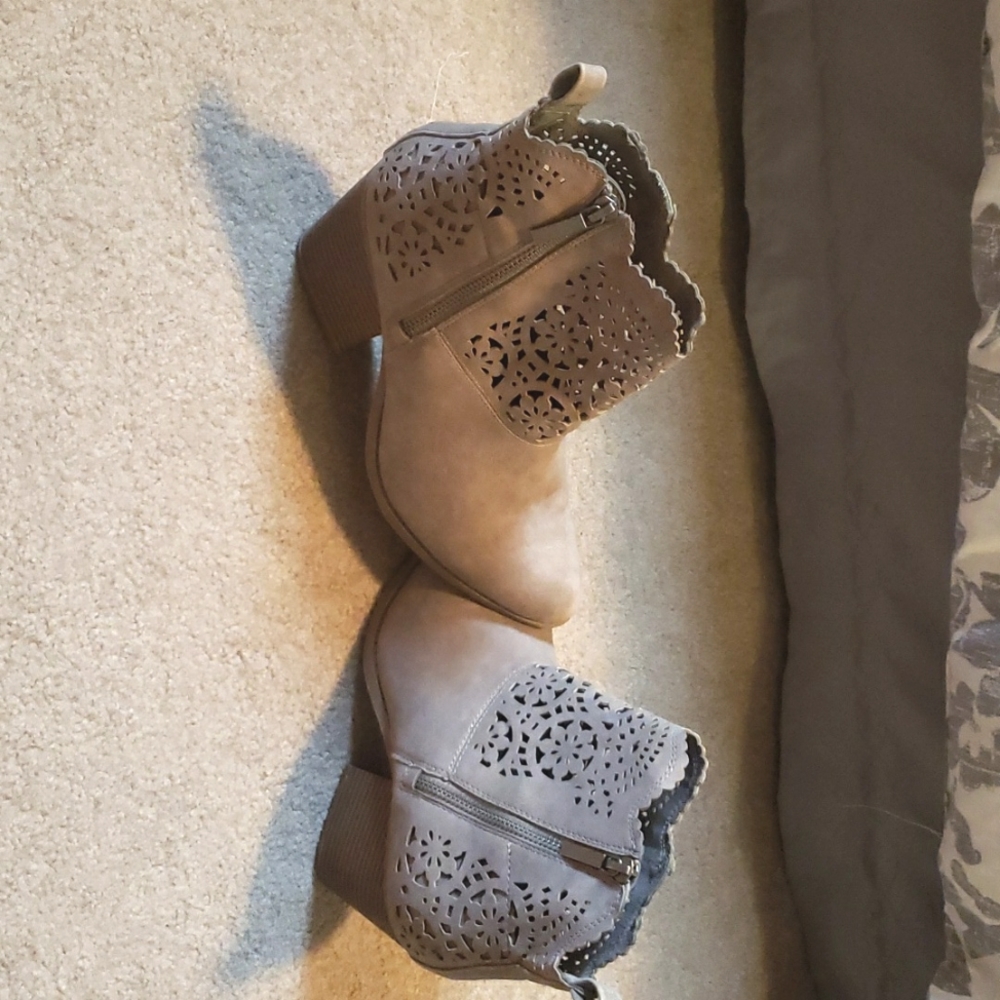 Cut out heeled booty.